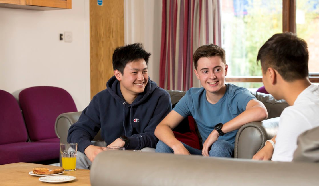 wycliffe boarding students sitting in the lounge room