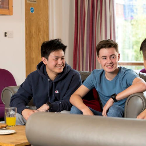 wycliffe boarding students sitting in the lounge room